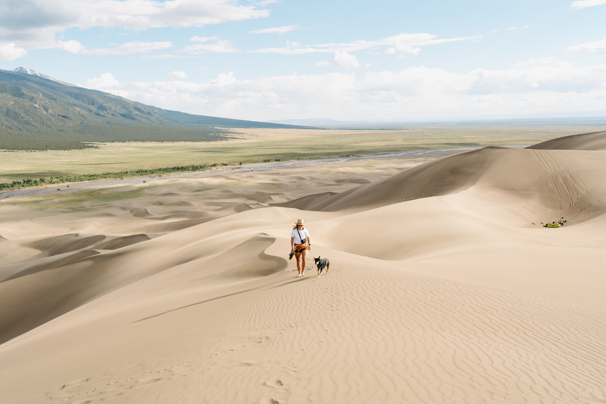 Kaylin and Willow hiking in Great Sand Dunes National Park.