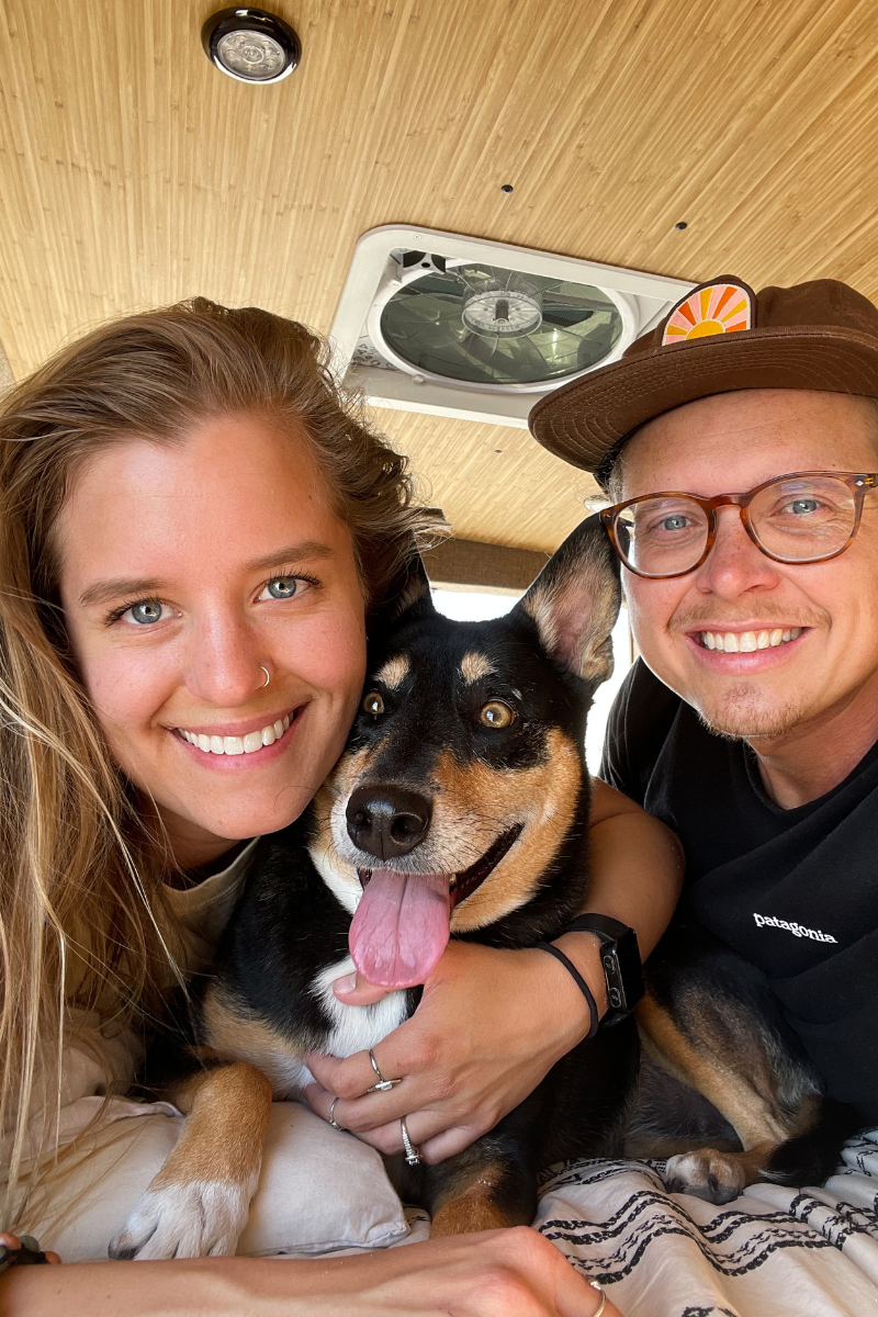 Kaylin, Tom, and Willow in their van.