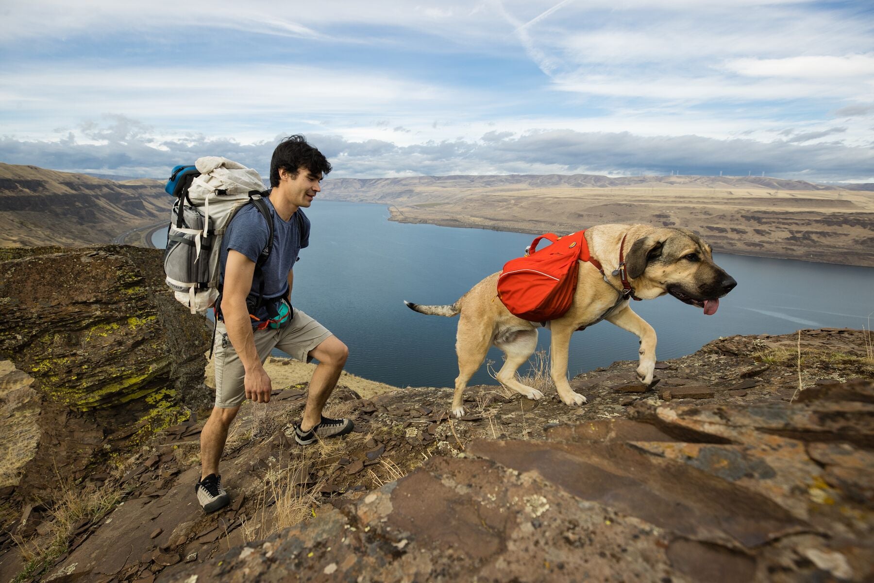 Palisades™ Pack on dog backpacking with human behind.