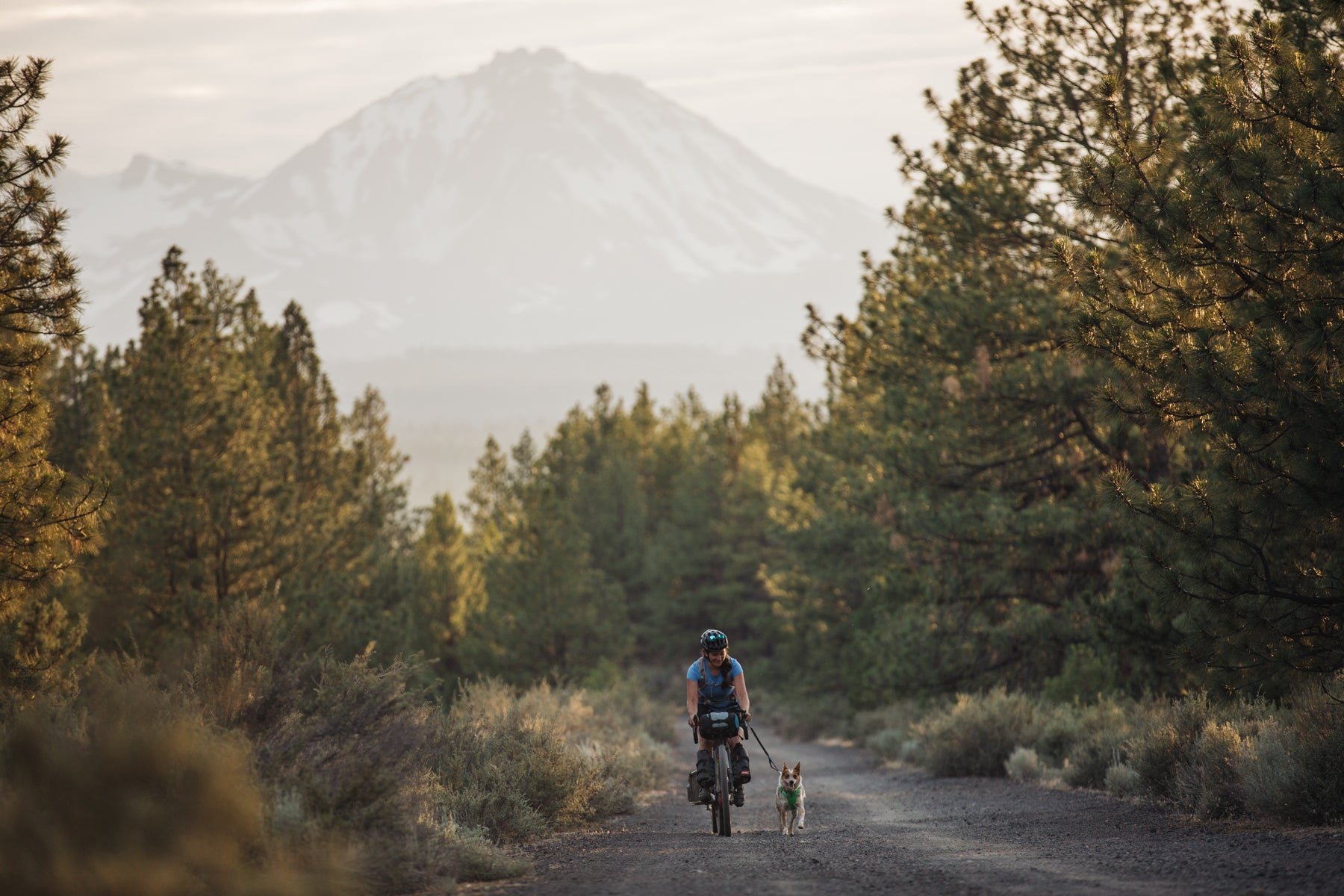 Kristen gravel bikepacking with dog Emma in the Ochocos.