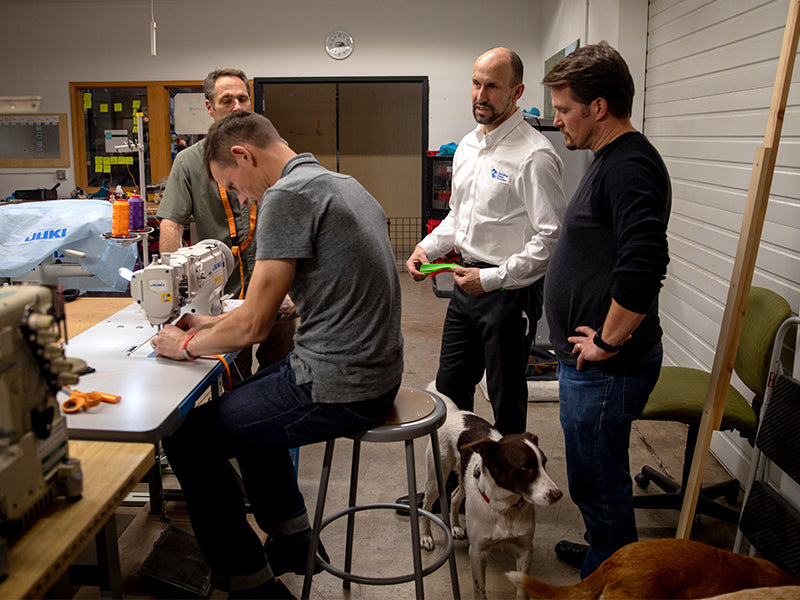 Ruffwear product team in design room sewing and making prototypes.