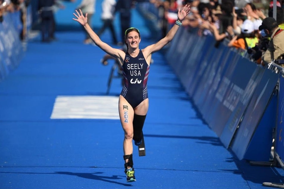 Triathlete Allysa Seely wins a race at the Paralympics. 