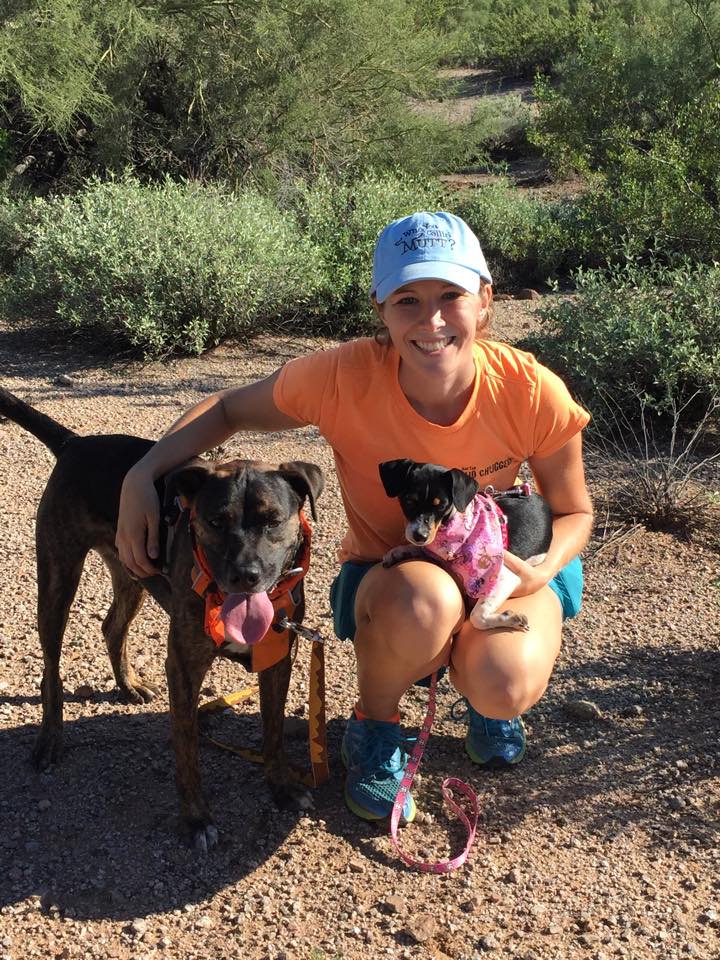 Woman with two dogs on a hike