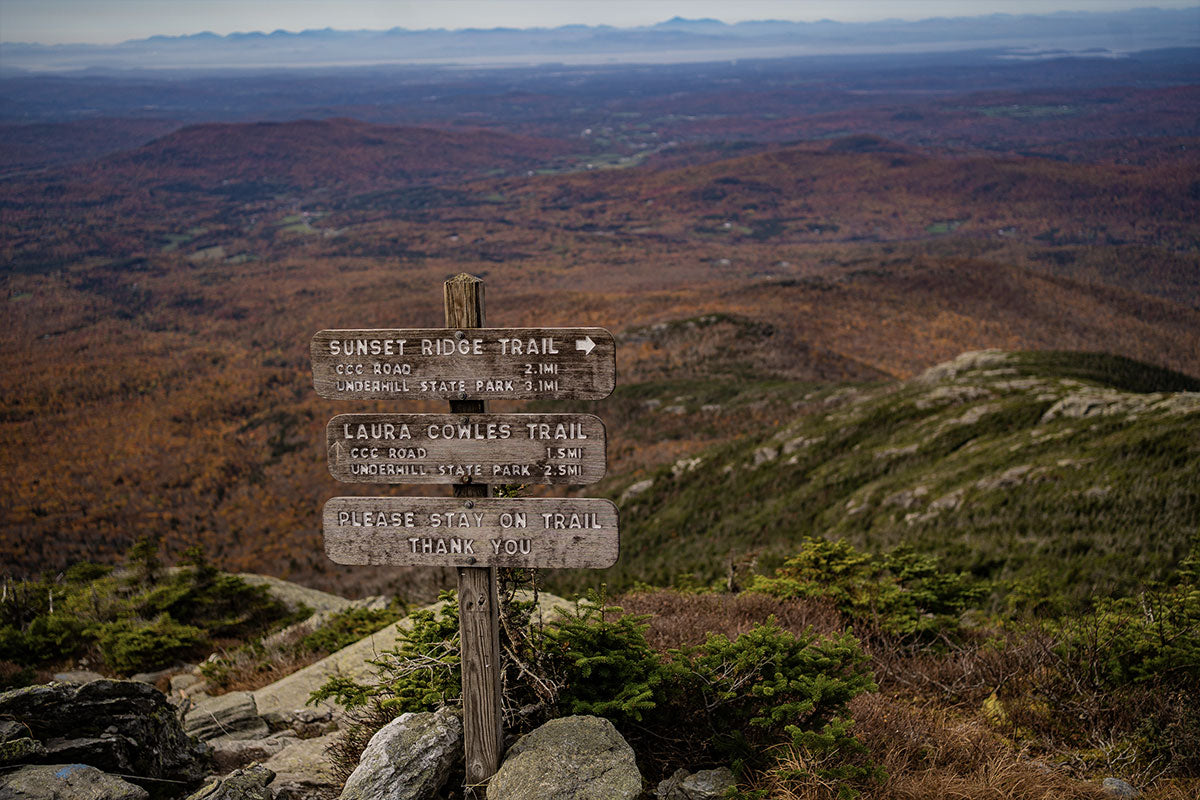 A trail sign pointing the way to Mt Mansfield