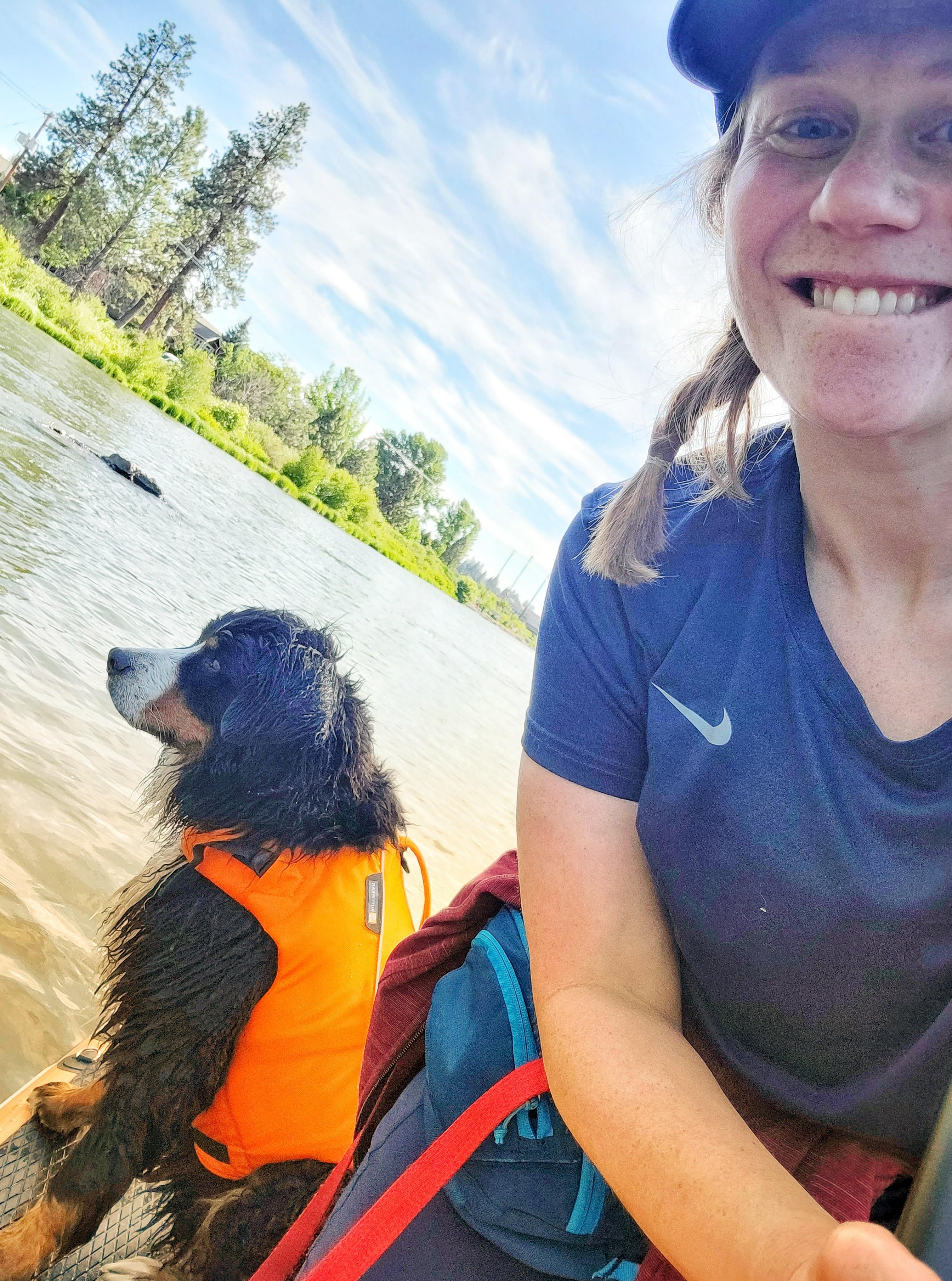 Ruffwear Pack member Jill paddleboarding with her dog.