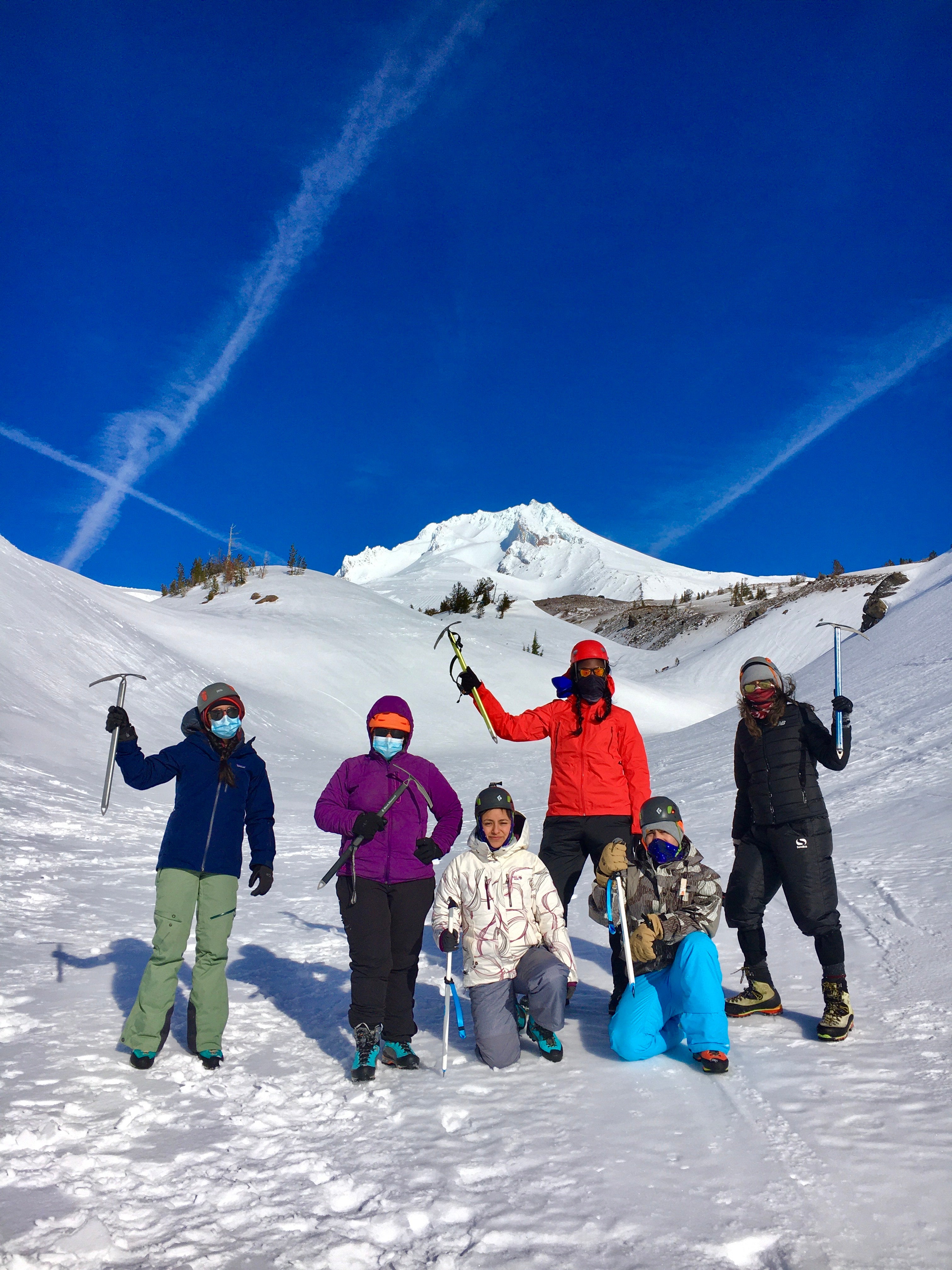 Theresa and a group of women of color on a mountaineering endeavor.