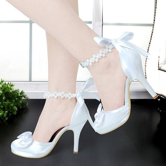 white heels with bow