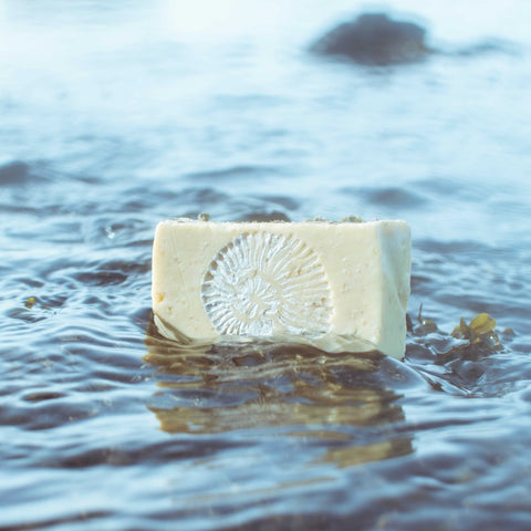 Bar of Frith Soap in ocean water.