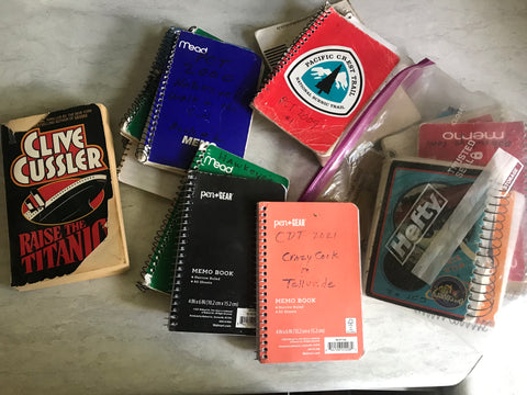 Collection of books and journals brought on trail