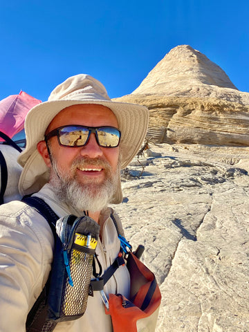 Kevin in front of a rock pyramid