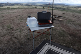 a stove and a water jug