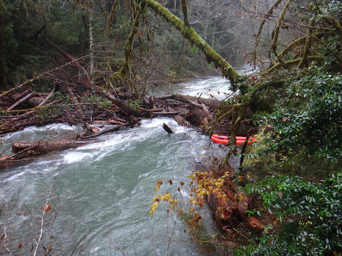 Raft stuck in the river blockage