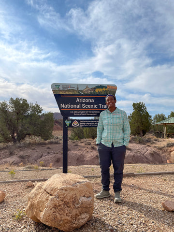 The author at a sign about the AZT