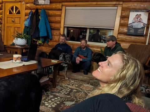 rafters in the cabin preparing for the trip the night before