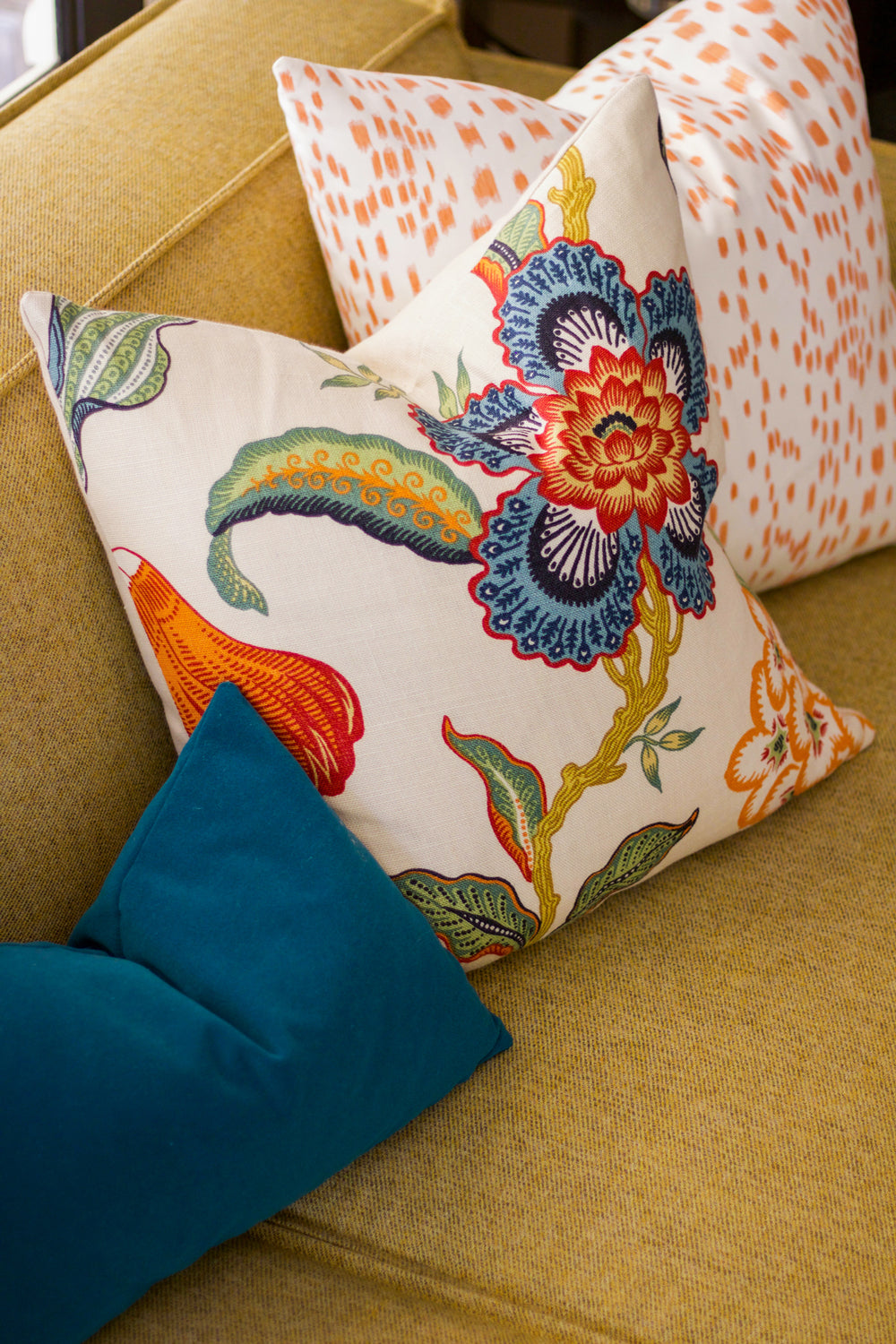 arianna belle designer pillow combination on sectional sofa - Peacock Velvet,  Hot House Spark, Les Touches Orange | Home of Natalie Steen