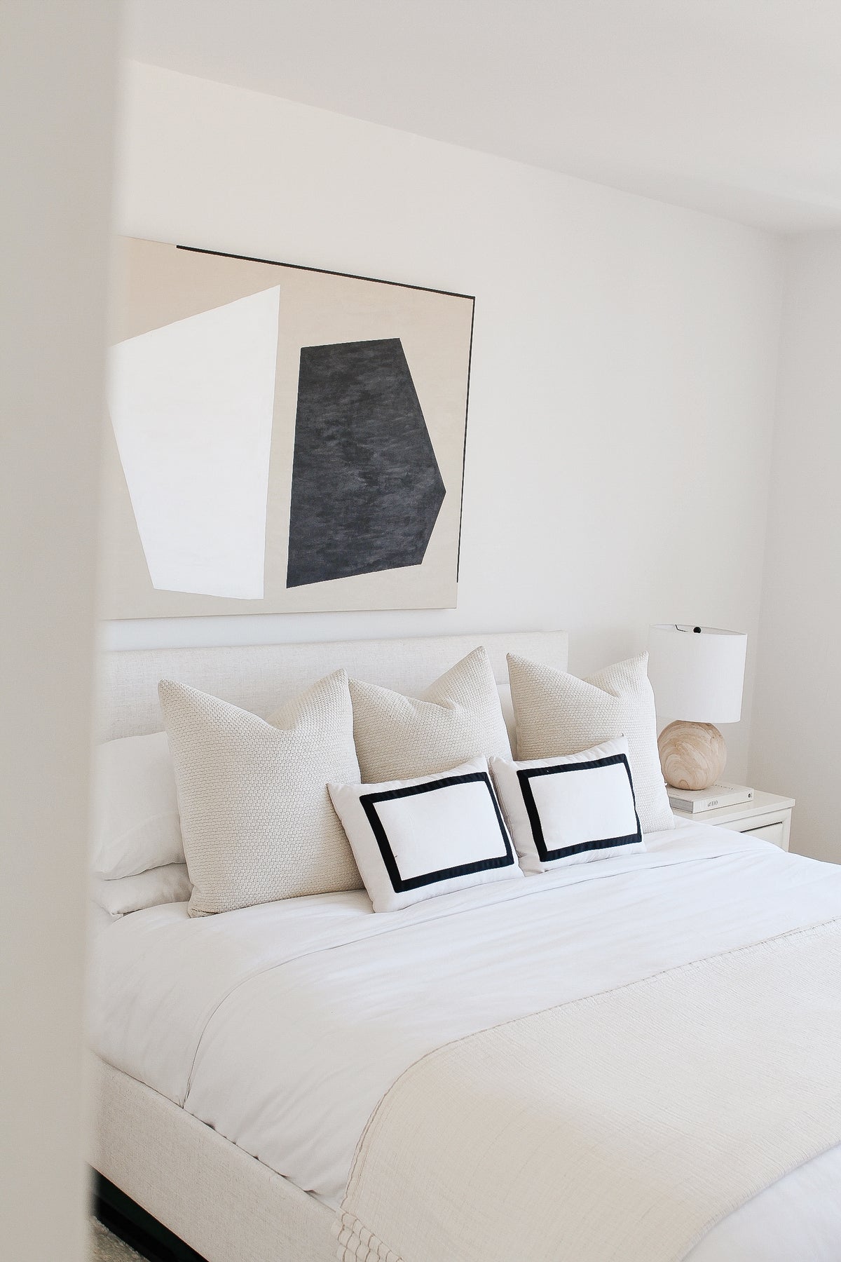 Chic Black and White Minimalist Bedroom That Feels Serene | Arianna Belle Pillows | home of Erika Fox