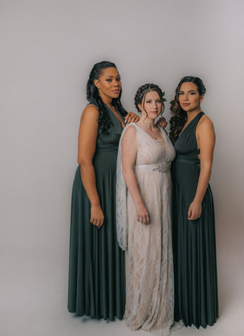 Models wearing the Olive Green Sakura Maxi Convertible Dress and a bride wearing the Daffodil Lace Convertible Dress.