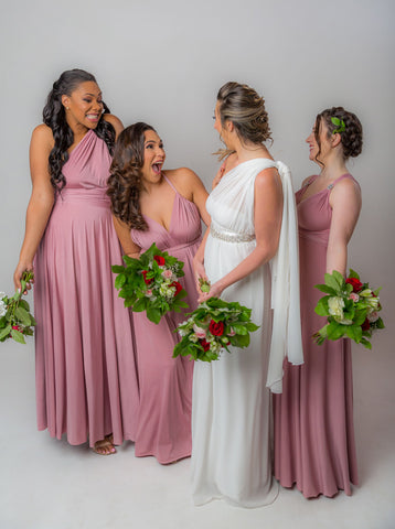 Bride and her 3 bridesmaid wearing the Henkaa Dusty Rose Infinity Dress