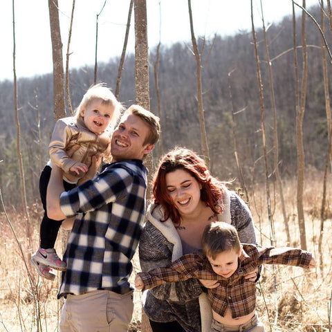 Amanda, Kevin and their two young children.