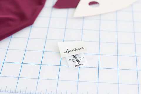 Supporting the local economy through sustainable shopping: Henkaa convertible and multiway dresses are made designed and made in Canada as seen on our tags. 