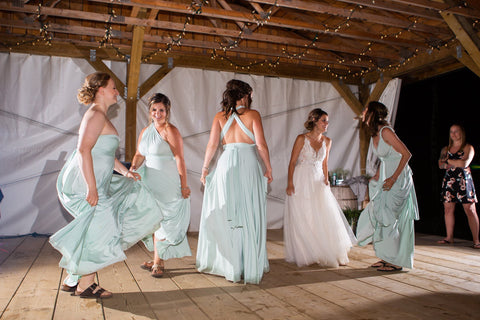 Ashley's bridesmaids dance the night away in their Mint Green Henkaa Convertible Dresses made in Canada.