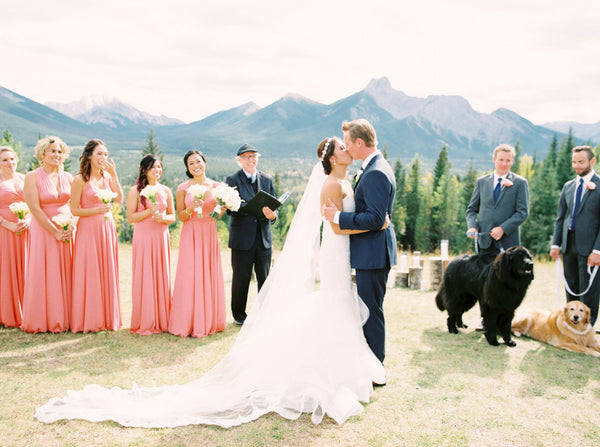 This beautiful classic, traditional wedding featuring peach pink coral bridesmaids dresses will have you swooning for days