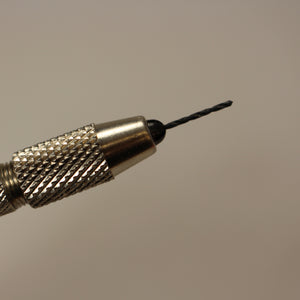 Spring loaded brass center punch – Proof Fly Fishing