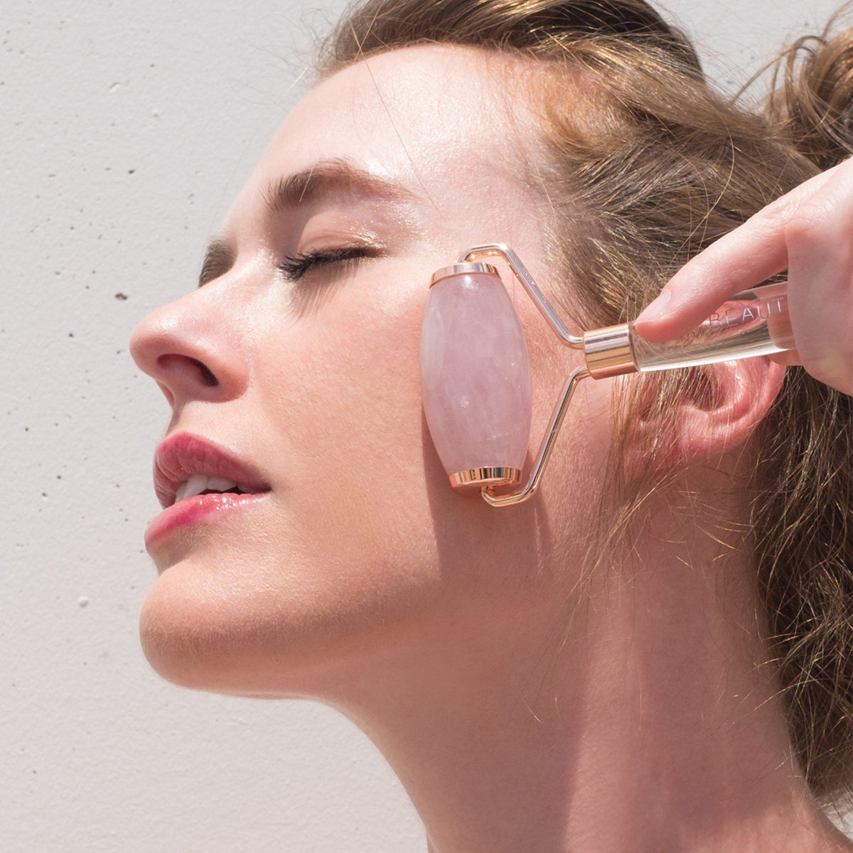 rose quartz face roller before and after