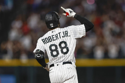 Chicago White Sox center fielder Luis Robert Jr. rounding the bases after one of his 27 home runs in 2023.