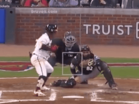 Braves second baseman Ozzie Albies gets a strike called well off the plate.