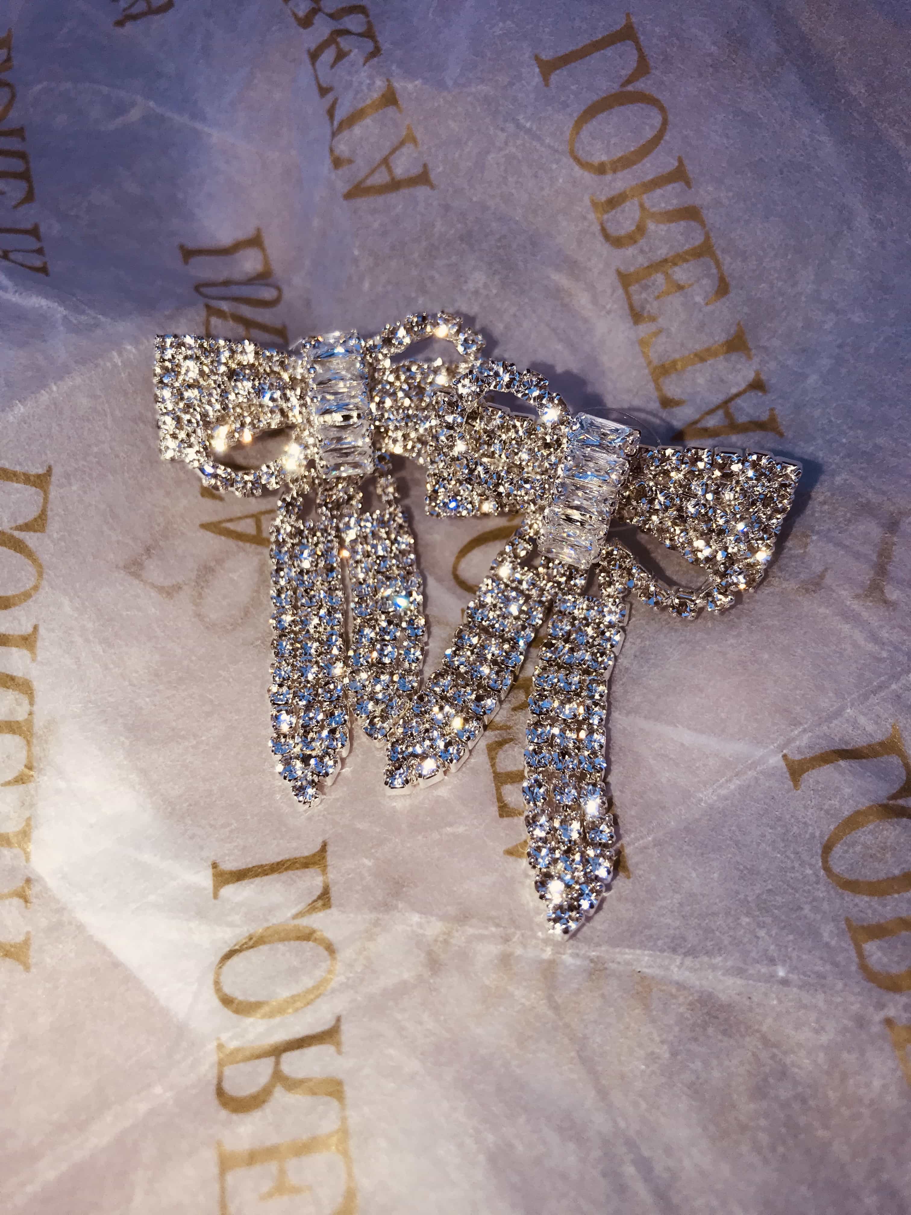 Crystal Bow Drop Down Earrings