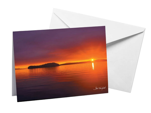 Purple, orange and yellow skies over the ocean photography blank greeting card by Shel Neufeld. 