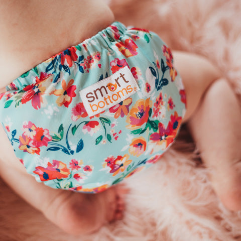 aqua floral cloth diaper on a baby Smart Bottoms Smart One cloth diaper