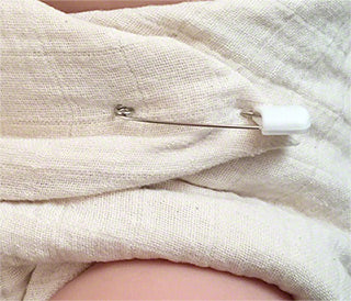 pinned muslin diaper close up