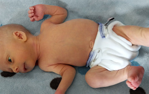 preemie baby in cloth diapers