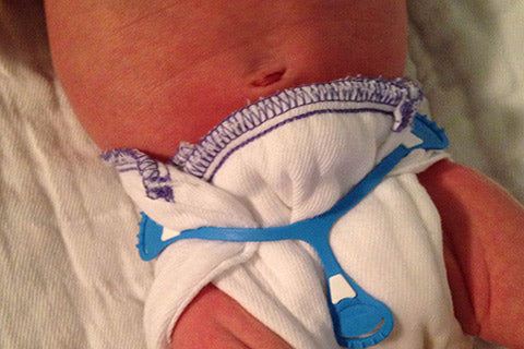 preemie purple edge prefold on baby