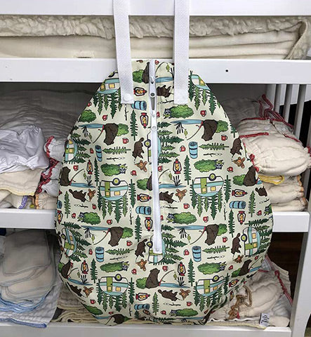 Smart Bottoms hanging wet bag on changing table
