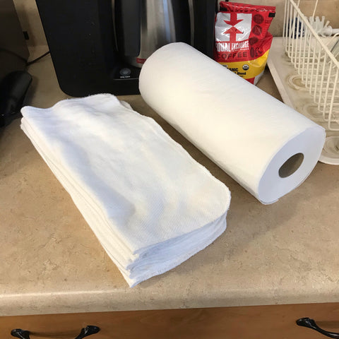 paper towels and kitchen cloths on a counter