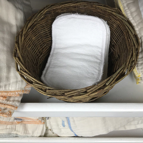 cotton baby wipes in a basket