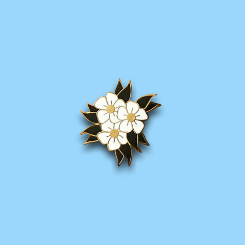 white flower pin