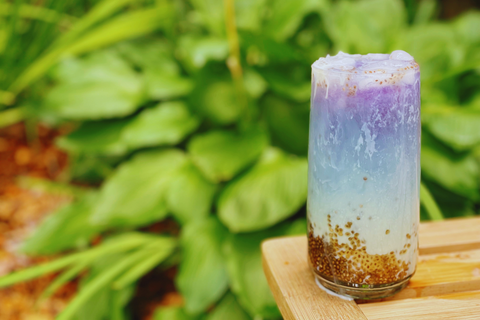 layered chia seed boba recipe with blues, purples and tea chia seed pudding in natural setting
