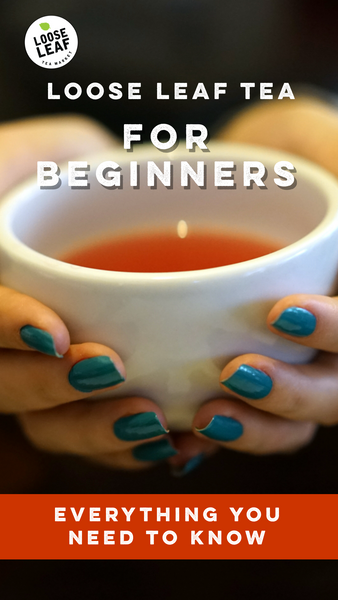 Hands holding a cup of tea.