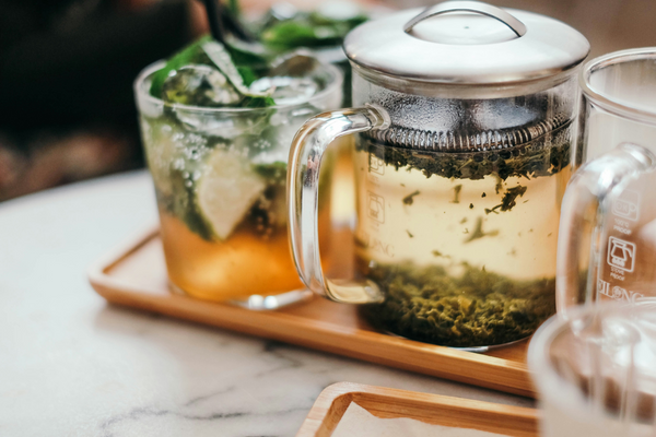 Sleek & Slender brewing in a glass teapot.