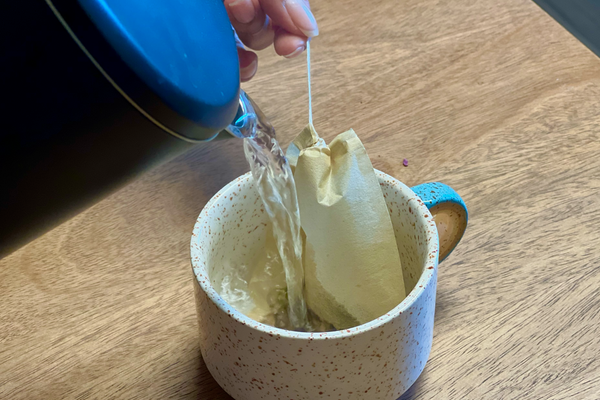 Pouring hot water over the Sugarproof tea.