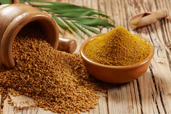 fenugreek in wooden bowl and spoon for prosperity