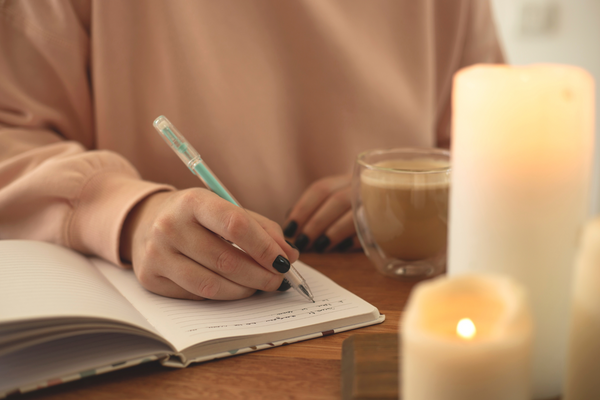 woman journaling for her mental health
