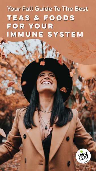 Woman wearing hat with falling leaves.