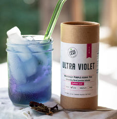 Bright blue organic brewed tea and Ultra Violet tea blend canister