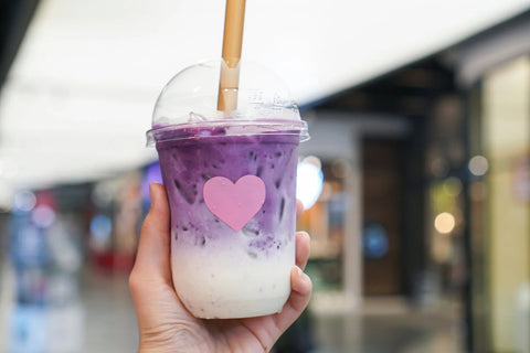 purple lavender latte in to go cup with small red heart
