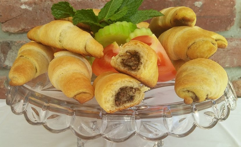 Zaatar- Crescent rolles served with fresh tomatos and cucumbers